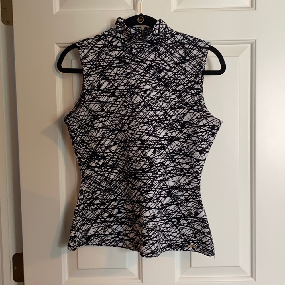 Calvin Klein size XS mock turtleneck top.